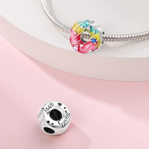 Sweet doughnut charm in 925 silver finish with colorful enamel and pavé crystals on snake chain