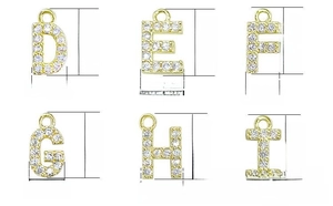 Detail view of mini gold-plated alphabet charms D-I with white zircon micro-pave setting