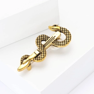 Elegant gold snake caduceus brooch with detailed metal texture for suits and coats