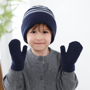 Kids winter knit set with dark blue striped beanie hat and matching warm mittens