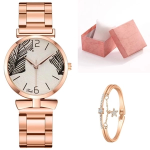 Rose gold quartz watch with palm leaf dial and star pendant bracelet in a gift box