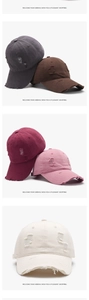 Detailed view of distressed baseball caps in various colors with vintage washed canvas fabric