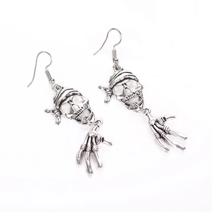Gothic punk silver skull and bone hand drop earrings on white background for Halloween