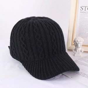 Women's black cable-knit baseball cap made of warm acrylic yarn in a solid color design