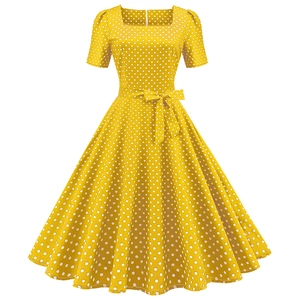 Vintage yellow A-line dress with white polka dots, square neck and waist tie detail