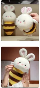 Close-up of soft rabbit bee plush toy showing fluffy texture and yellow stripes