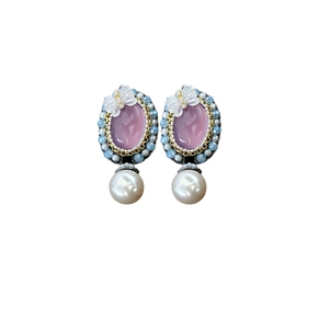 Vintage oval pink crystal earrings with a white bow and pearl pendant in court style