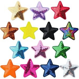 Macro shot of colorful sequin star patches in various shades for DIY apparel