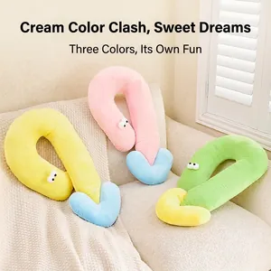 U-shaped plush pet pillow for cats and dogs with cute eyes and macaron color blocking