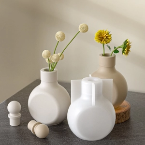 Macro view of minimalist resin silicone molds for DIY flower vase and round bottle crafts