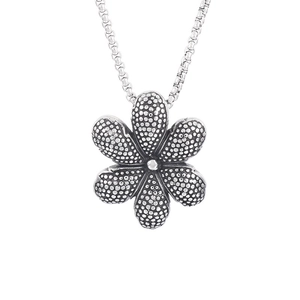 Vintage silver flower pendant necklace with textured dots on a stainless steel box chain