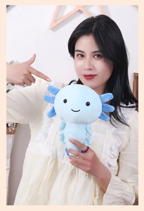 Blue axolotl plush toy held by a smiling person to show its 30cm portable size