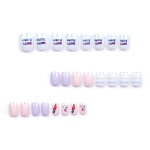 Short round Happy Easter press-on nails featuring cute bunny and carrot patterns