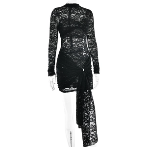 Detail of black sheer lace dress showing high neck and waist knot with long ribbon