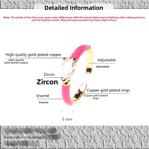 Detail of pink enamel adjustable ring featuring a pear-shaped zircon and gold plating