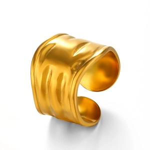 Polished gold irregular wavy wide band open ring in a modern geometric style