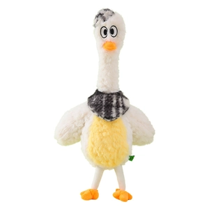 Plush yellow duck pet squeaky toy with a stylish black and white checkered scarf