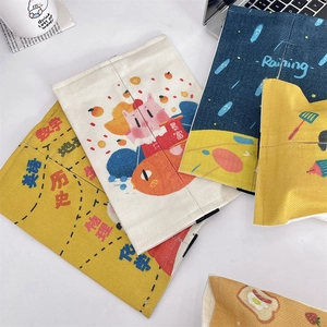 Cartoon fabric car tissue box covers in yellow, cream, and navy blue with cute patterns