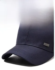 Detail of navy blue twill baseball cap showing curved brim and metal sportline logo