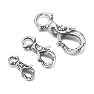 Three sizes of polished stainless steel skull lobster clasps for necklaces and keychains