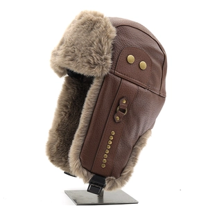 Winter thermal leather trapper hat with thick brown plush lining and rivet details