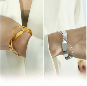 Exaggerated minimalist geometric open cuffs in gold and silver finish for women