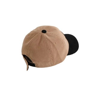 Kids corduroy baseball cap in beige and black patchwork with embroidered details