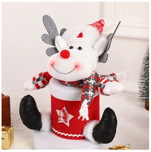 Detail of Christmas reindeer candy jar with red knit texture and soft plush decorations