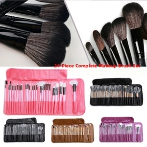 Detail view of 24-piece professional watercolor makeup brush set with rolled pouch