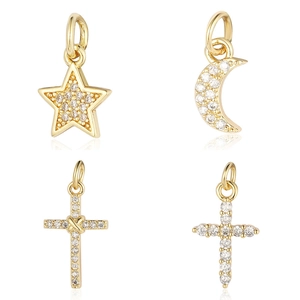 Set of gold cross, star, and moon charms with cubic zirconia for jewelry making
