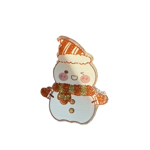 Cute acrylic Christmas snowman pin badge with glitter scarf on a clean white background