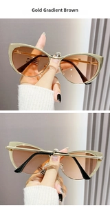 Detail of cat-eye sunglasses with gold metal frame and brown gradient lenses