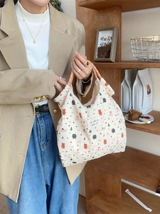 Quilted rabbit tote bag with cartoon bear prints and checkered straps for casual daily use