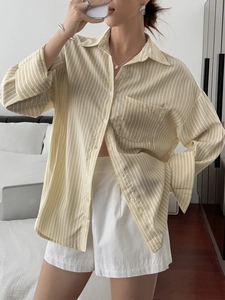 Women's yellow vertical striped long sleeve shirt with relaxed fit and collar design