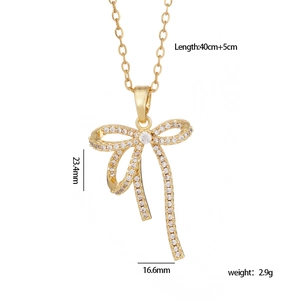 French vintage bow pendant necklace with white zircon in gold finish, 45cm chain