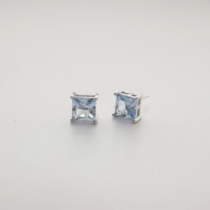 Square light blue cubic zirconia stud earrings in 925 sterling silver four-prong setting