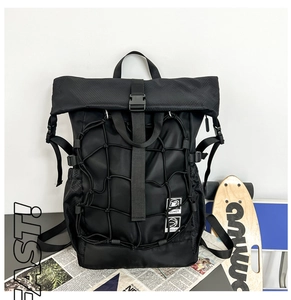 Detail of black waterproof roll-top backpack with mesh helmet net and street style design