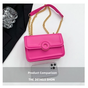 Detailed macro shot of bright pink PU leather shoulder bag with gold chain and round buckle