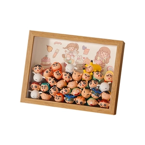 Light wood frame display case filled with miniature Crayon Shin-chan cartoon figures