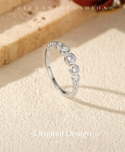 Macro shot of S925 sterling silver bubble ring with five sparkling moissanite stones