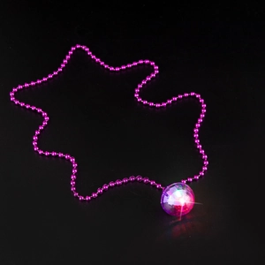 Macro shot of luminous disco ball pendant with multi-color LED glow on purple bead chain