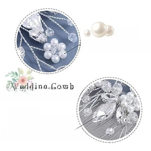 Close-up of silver wire bridal hair comb with pearls, crystals and rhinestones