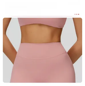 Detail der rosa High-Waist Yoga-Shorts mit V-Bund und verstärkten Nähten am Bauch