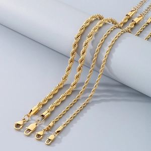 Set of four gold stainless steel rope chain anklets in varying widths with lobster clasps