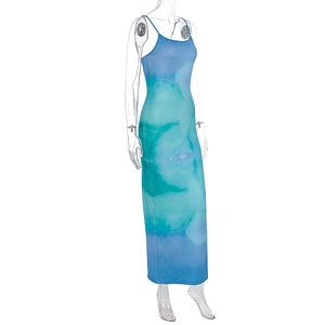 Side view of slim fit backless dress with blue and green watercolor gradient pattern