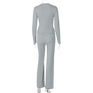 Rear view of grey slim fit long sleeve top and wide leg knit trousers set