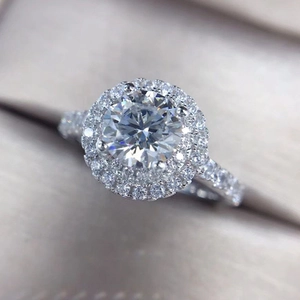 Exquisite double halo round zircon engagement ring with pavé stones in classic white gold