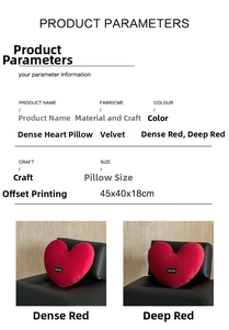Detailed size chart and red velvet heart-shaped pillow on a modern black sofa