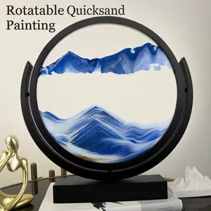 Rotatable blue sand art glass landscape decor with a black circular frame and stand
