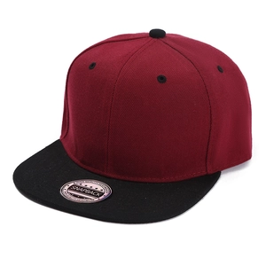 Detail of snapback cap with burgundy crown, black brim, and contrast eyelets